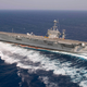 Illustration for article titled Stunning Image of US Navy Nuclear Supercarrier Skidding Like Crazy Over the Atlantic